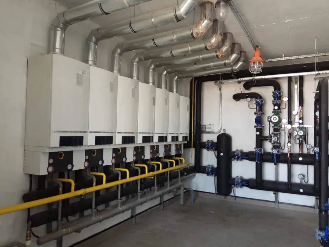 Boiler room with wall-mounted boilers